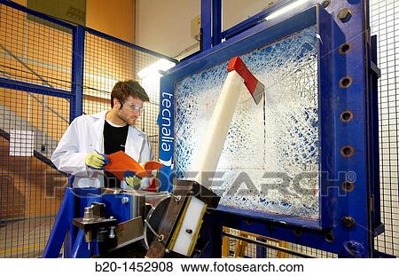 Axe impact to determinate resistance and rupture point of safety glasses, material homologation, Technology Research Center, Tecnalia Construction, CIDEMCO-Tecnalia Research & Innovation, development of new products and innovative solutions View Large Photo Image Stock Photo - Axe impact to determinate resistance and rupture point of safety glasses, material homologation, Technology Research Center, Tecnalia Construction, CIDEMCO-Tecnalia Research & Innovation, development of new products and innovative solutions. Fotosearch