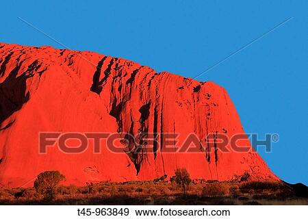 Ayers Rock at sunset, Uluru-Kata Tjuta National Park, Northern Territory, Australia View Large Photo Image Stock Photo - Ayers Rock at sunset, Uluru-Kata Tjuta National Park, Northern Territory, Australia. Fotosearch