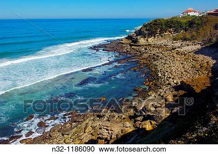 Azenhas do Mar, Cliffs at Praia das ma? as das ma? as Beach, Colares, Lisbon district, Sintra coast, Portugal, Europe. View Large Photo Image Stock Image - Azenhas do Mar, Cliffs at Praia das ma? as das ma? as Beach, Colares, Lisbon district, Sintra coast, Portugal, Europe.. Fotosearch