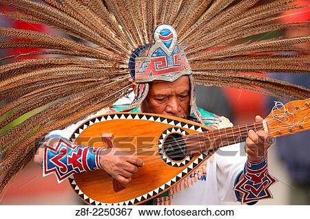 Aztec dance performed in New Years eve in San Miguel Arcangel temple. View Large Photo Image Stock Photo - Aztec dance performed in New Years eve in San Miguel Arcangel temple.. Fotosearch