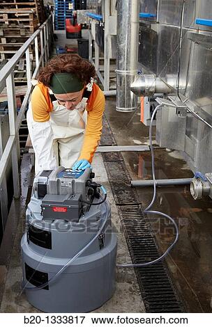 Azti-Tecnalia researcher collecting water samples for analysis, box washing machine, Mercabilbao fruits and vegetables wholesale market, Basauri, Bilbao, Bizkaia, Euskadi, Spain View Large Photo Image Stock Photo - Azti-Tecnalia researcher collecting water samples for analysis, box washing machine, Mercabilbao fruits and vegetables wholesale market, Basauri, Bilbao, Bizkaia, Euskadi, Spain. Fotosearch