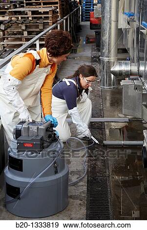Azti-Tecnalia researchers collecting water samples for analysis, box washing machine, Mercabilbao fruits and vegetables wholesale market, Basauri, Bilbao, Bizkaia, Euskadi, Spain View Large Photo Image Stock Photo - Azti-Tecnalia researchers collecting water samples for analysis, box washing machine, Mercabilbao fruits and vegetables wholesale market, Basauri, Bilbao, Bizkaia, Euskadi, Spain. Fotosearch