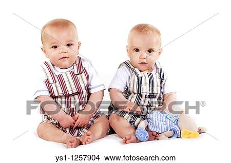 BABIES, BOYS PLAYING WITH A SOFT TOY View Large Photo Image Picture - BABIES, BOYS PLAYING WITH A SOFT TOY. Fotosearch
