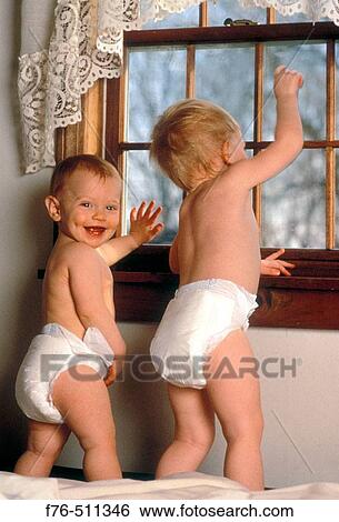 Babies (brother and sister), ages 1 and 2. View Large Photo Image Stock Photograph - Babies (brother and sister), ages 1 and 2.. Fotosearch