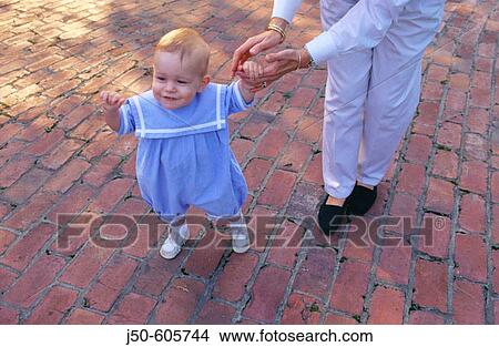Babies first steps View Large Photo Image Picture - Babies first steps. Fotosearch