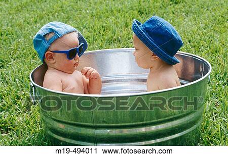babies in a outdoor tub View Large Photo Image Stock Image - babies in a outdoor tub. Fotosearch