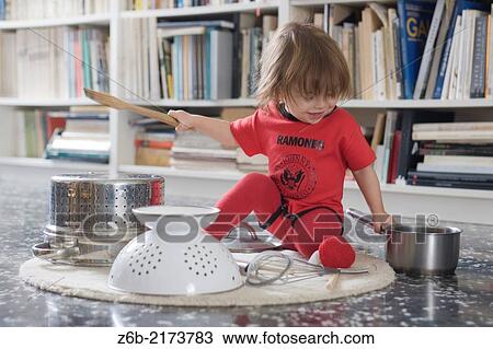 Baby, 15 Months, Noise, Kitchen Tool, Colander, Pan, Lid, Wooden fork, Whisk, Ramones body-Suit, carpet, books View Large Photo Image Stock Image - Baby, 15 Months, Noise, Kitchen Tool, Colander, Pan, Lid, Wooden fork, Whisk, Ramones body-Suit, carpet, books. Fotosearch