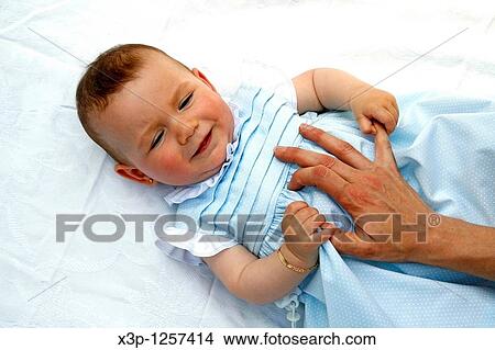 Picture - Baby and her mother. Fotosearch