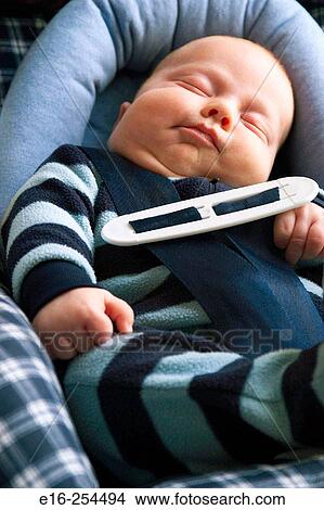 baby asleep in car seat View Large Photo Image Picture - baby asleep in car seat. Fotosearch