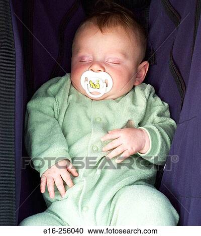 Baby asleep in stroller View Large Photo Image Stock Image - Baby asleep in stroller. Fotosearch