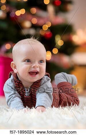 Baby boy at Christmas View Large Photo Image Picture - Baby boy at Christmas. Fotosearch