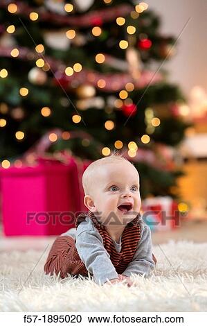 Baby boy at Christmas View Large Photo Image Stock Image - Baby boy at Christmas. Fotosearch