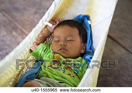 Stock Photography - Baby Boy in hammock. Fotosearch
