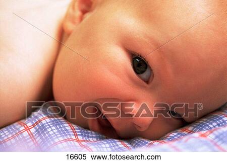 Stock Photography - Baby boy on blanket. Fotosearch