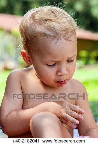 baby boy playing at a picnic. View Large Photo Image Stock Image - baby boy playing at a picnic.. Fotosearch