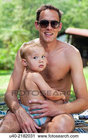 baby boy playing with his father. View Large Photo Image Stock Image - baby boy playing with his father.. Fotosearch