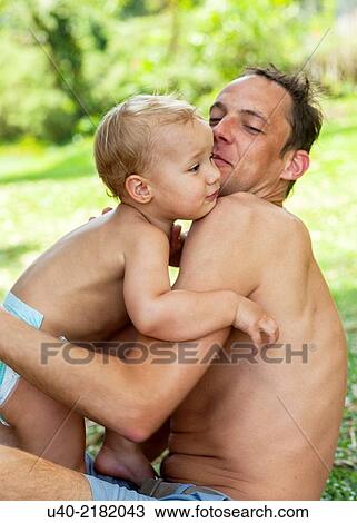 baby boy playing with his father. View Large Photo Image Stock Image - baby boy playing with his father.. Fotosearch