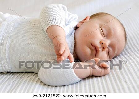 Baby boy two month old sleeping in the bed, Madrid, Spain View Large Photo Image Stock Image - Baby boy two month old sleeping in the bed, Madrid, Spain. Fotosearch