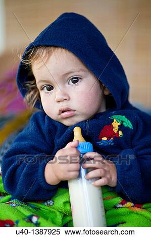 Stock Photography - Baby boy with bottle. Fotosearch