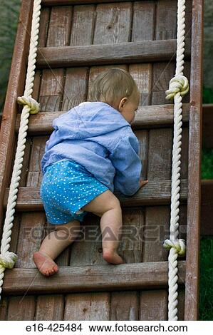 Baby climbing ladder View Large Photo Image Picture - Baby climbing ladder. Fotosearch