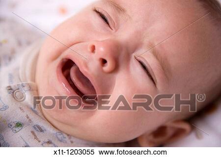 Stock Photography - Baby crying.. Fotosearch