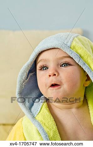 Baby face posed at bedroom View Large Photo Image Stock Photo - Baby face posed at bedroom. Fotosearch