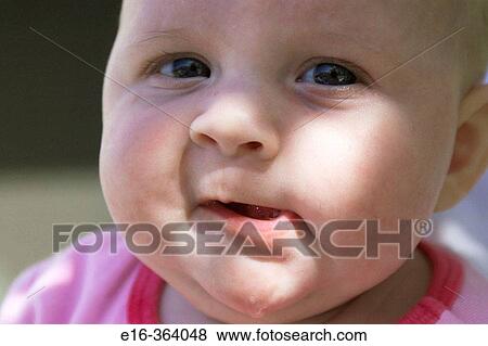 Stock Photo - baby face. Fotosearch