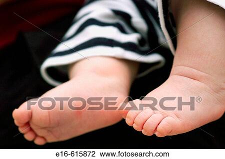 Stock Image - Baby feet. Fotosearch