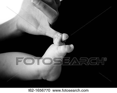 Stock Image - Baby foot. Fotosearch