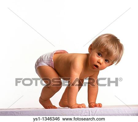 BABY GIRL AGAINST WHITE BACKGROUND View Large Photo Image Stock Photograph - BABY GIRL AGAINST WHITE BACKGROUND. Fotosearch