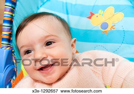 Baby girl laughing View Large Photo Image Stock Photo - Baby girl laughing. Fotosearch