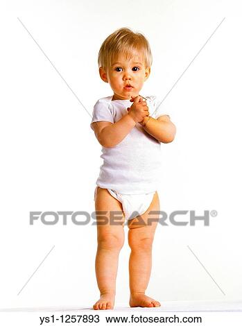BABY, GIRL WITH NAPPY AGAINST WHITE BACKGROUND View Large Photo Image Stock Image - BABY, GIRL WITH NAPPY AGAINST WHITE BACKGROUND. Fotosearch
