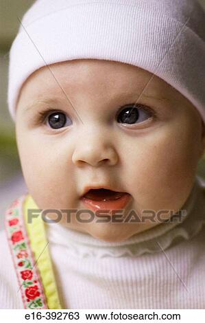 baby girl with white cap View Large Photo Image Stock Image - baby girl with white cap. Fotosearch