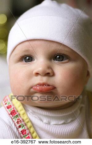 baby girl with white cap View Large Photo Image Stock Photo - baby girl with white cap. Fotosearch