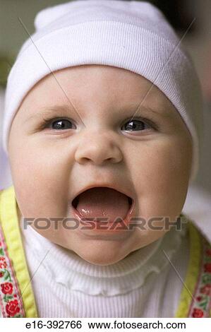 baby girl with white cap View Large Photo Image Stock Photograph - baby girl with white cap. Fotosearch