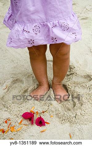 Baby girl's feet View Large Photo Image Stock Photo - Baby girl's feet. Fotosearch