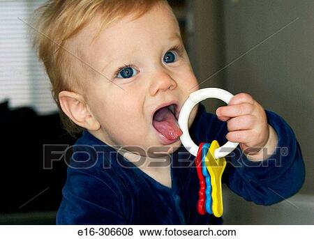 Stock Photo - baby holding keys. Fotosearch