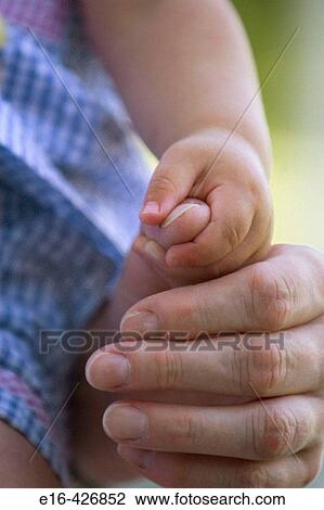 baby holding mother's hand View Large Photo Image Stock Image - baby holding mother's hand. Fotosearch