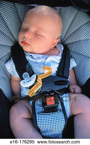 Baby in car seat View Large Photo Image Stock Photography - Baby in car seat. Fotosearch