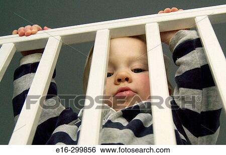 baby in crib View Large Photo Image Stock Photograph - baby in crib. Fotosearch