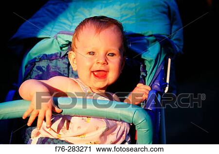 Baby in stroller. St. Louis. Missouri. USA View Large Photo Image Stock Image - Baby in stroller. St. Louis. Missouri. USA. Fotosearch