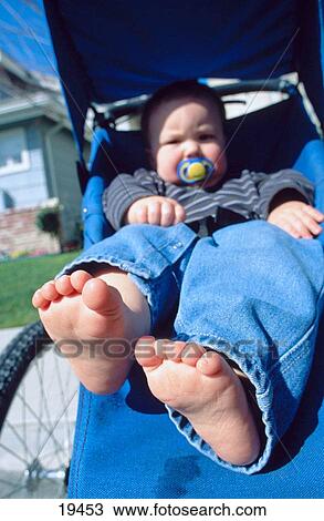 Baby in stroller View Large Photo Image Stock Image - Baby in stroller. Fotosearch