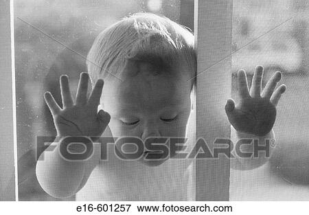 Baby leaning on screen door View Large Photo Image Stock Photo - Baby leaning on screen door. Fotosearch