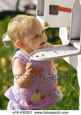 Baby looking into mailbox View Large Photo Image Stock Image - Baby looking into mailbox. Fotosearch