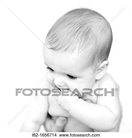 Baby looks at the world through the eyes of the first time View Large Photo Image Picture - Baby looks at the world through the eyes of the first time. Fotosearch