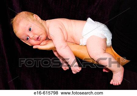 Stock Photo - baby on mother's arm. Fotosearch