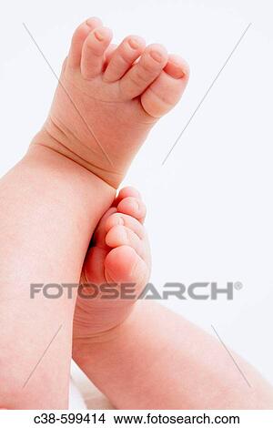Baby Playing With His Feet View Large Photo Image Picture - Baby Playing With His Feet. Fotosearch