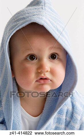 Baby portrait in bathing wrap View Large Photo Image Stock Image - Baby portrait in bathing wrap. Fotosearch
