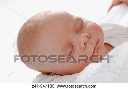 Baby resting on mum's arms View Large Photo Image Stock Image - Baby resting on mum's arms. Fotosearch
