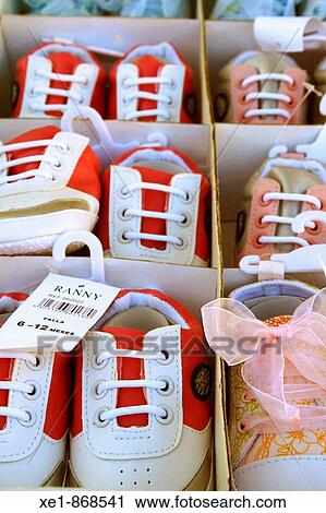 Baby shoes. Corneilla-de-Conflent, Languedoc-Roussillon, France View Large Photo Image Stock Image - Baby shoes. Corneilla-de-Conflent, Languedoc-Roussillon, France. Fotosearch